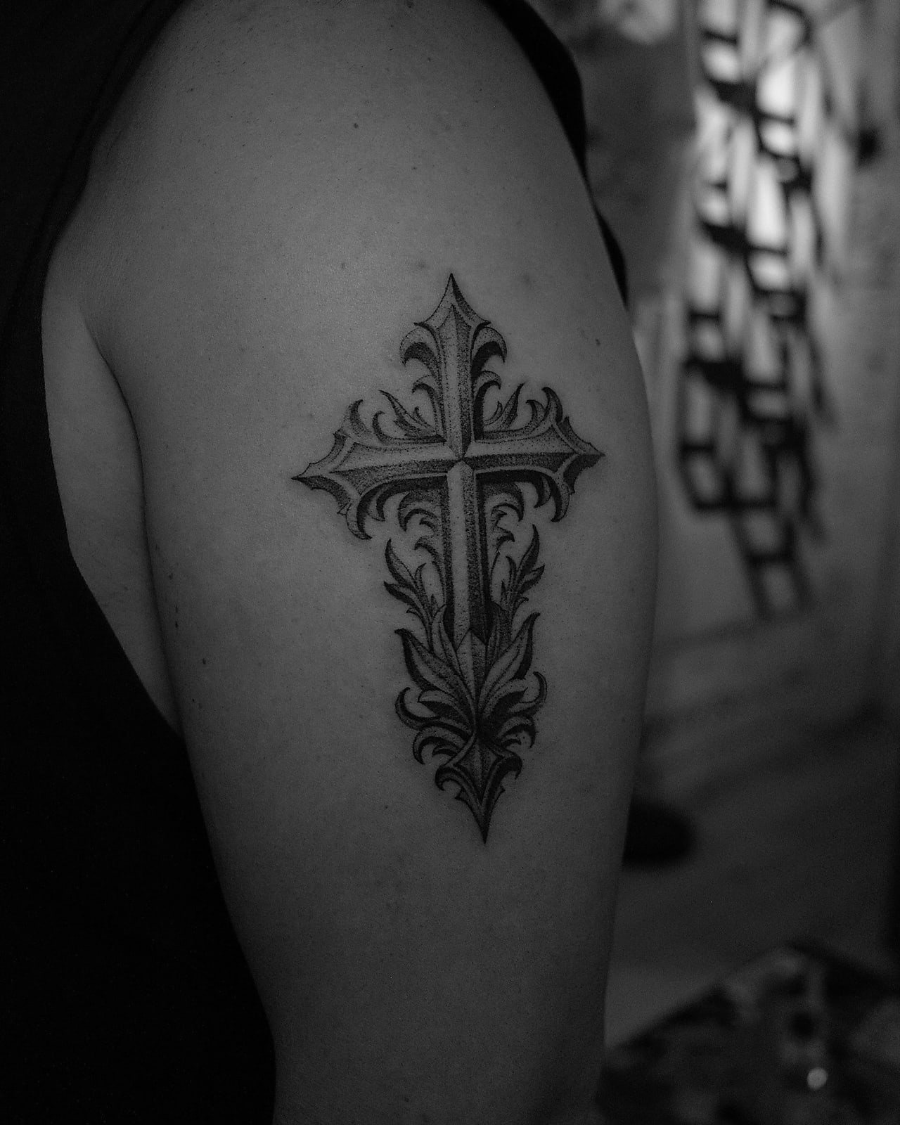 Gothic cross, dotwork tattoo on the upper arm by Bobby, STUDIO MIBO